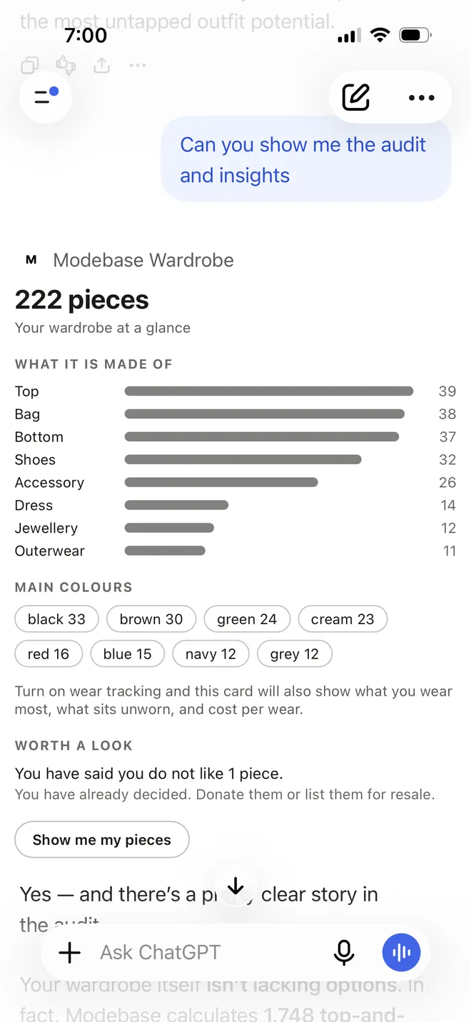 A wardrobe audit card for a 222 piece wardrobe with a breakdown by type and colour